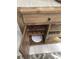 Rustic buffet with wine storage and shelving at 2217 Sequoia Dr, Clearwater, FL 33763