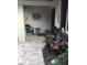 Cozy front porch with seating area and plants at 2217 Sequoia Dr, Clearwater, FL 33763