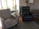 Two comfy chairs and side table in the living room at 2217 Sequoia Dr, Clearwater, FL 33763