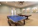 Game room with ping pong and billiard tables at 2721 Tarragona Way, Wesley Chapel, FL 33543