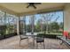 Spacious screened patio perfect for outdoor dining at 2721 Tarragona Way, Wesley Chapel, FL 33543