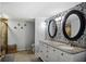 Elegant bathroom with dual sinks and granite countertop at 3006 Mockingbird Ct, Clearwater, FL 33762