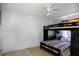 bedroom with a bunk bed and playful decor at 3006 Mockingbird Ct, Clearwater, FL 33762