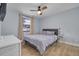 Bright bedroom featuring a comfortable bed and plenty of natural light at 3102 Jarvis St, Holiday, FL 34690