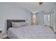 Cozy bedroom with a plush bed and ample space at 3102 Jarvis St, Holiday, FL 34690