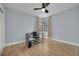 Bright bedroom with tile floors and built-in workspace at 3102 Jarvis St, Holiday, FL 34690