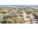 Aerial view of property; single-Gathering home in a residential neighborhood by the water at 3230 San Bernadino St, Clearwater, FL 33759