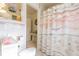 Clean bathroom with a nautical-themed shower curtain at 3230 San Bernadino St, Clearwater, FL 33759