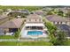 Aerial view of house, pool, and backyard at 3795 Morgons Castle Ct, Land O Lakes, FL 34638