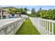 Neatly landscaped yard with a white fence at 3795 Morgons Castle Ct, Land O Lakes, FL 34638