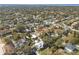 Aerial view showing home's location in a residential neighborhood near the water at 3815 W San Juan St, Tampa, FL 33629