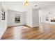 Bright dining room with hardwood floors and white wainscoting at 3815 W San Juan St, Tampa, FL 33629