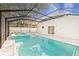 Relaxing pool and spa with covered patio at 3815 W San Juan St, Tampa, FL 33629