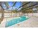 Refreshing pool and spa with covered patio at 3815 W San Juan St, Tampa, FL 33629