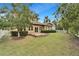 Spacious backyard with patio and lush grass at 402 Islebay Dr, Apollo Beach, FL 33572