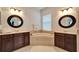 Large bathroom with double sinks and a garden tub at 402 Islebay Dr, Apollo Beach, FL 33572