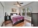 Bright bedroom with hardwood floors and a ceiling fan at 402 Islebay Dr, Apollo Beach, FL 33572