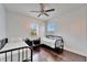 Bedroom with two twin beds and hardwood floors at 402 Islebay Dr, Apollo Beach, FL 33572