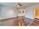 Spacious bedroom with hardwood floors and ceiling fan at 402 Islebay Dr, Apollo Beach, FL 33572