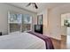 Main bedroom with hardwood floors and window blinds at 402 Islebay Dr, Apollo Beach, FL 33572