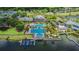 Aerial view of community pool, clubhouse, and marina at 402 Islebay Dr, Apollo Beach, FL 33572