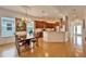 Bright dining room with hardwood floors and a chandelier at 402 Islebay Dr, Apollo Beach, FL 33572