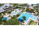 Community pool with multiple pools, a waterslide, and a lighthouse at 402 Islebay Dr, Apollo Beach, FL 33572