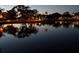 Night view of calm water with lights reflecting at 410 W Lemon St, Tarpon Springs, FL 34689