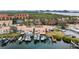 Aerial showing waterfront homes, boat docks, and parking at 4208 Harbor House Dr, Tampa, FL 33615