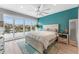 Main bedroom with water views, ceiling fan, and light decor at 4208 Harbor House Dr, Tampa, FL 33615