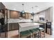 Modern kitchen with gray cabinets, quartz countertops, and stainless steel appliances at 4208 Harbor House Dr, Tampa, FL 33615