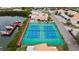 Two well-maintained tennis courts with waterfront views at 4208 Harbor House Dr, Tampa, FL 33615