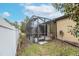 Enclosed patio with screen and tiled floor, great for outdoor relaxation at 430 Cedar Falls Dr, Apollo Beach, FL 33572