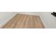 Walk-in closet with light wood laminate flooring at 4351 56Th N Ave, St Petersburg, FL 33714