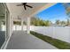 Covered patio with ceiling fans, providing shade and a relaxing outdoor space at 4351 56Th N Ave, St Petersburg, FL 33714