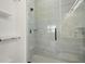 Large walk-in shower with glass enclosure and hexagon tile floor at 4351 56Th N Ave, St Petersburg, FL 33714