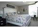 Spacious main bedroom with king-size bed and coastal decor at 4361 Tahitian Gardens Cir # C, Holiday, FL 34691