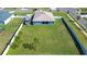 Aerial view showcasing house, large backyard, and RV parking at 4439 Devinshire Fields Loop, Plant City, FL 33567