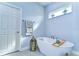 Relaxing bathroom with a freestanding bathtub and a window at 4439 Devinshire Fields Loop, Plant City, FL 33567