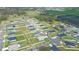 Aerial view of a residential community with various house styles at 4439 Devinshire Fields Loop, Plant City, FL 33567