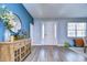 Bright and spacious entryway with a wooden console table at 4439 Devinshire Fields Loop, Plant City, FL 33567