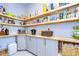 Well-organized pantry with ample shelving for storage at 4439 Devinshire Fields Loop, Plant City, FL 33567