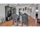 Dining area with granite table and black leather chairs at 4650 Cove Cir # 509, St Petersburg, FL 33708