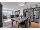 Dining room with granite table and black leather chairs at 4650 Cove Cir # 509, St Petersburg, FL 33708