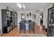 Bright dining room with a granite table and black leather chairs at 4650 Cove Cir # 509, St Petersburg, FL 33708