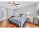 Main bedroom with hardwood floors and access to the backyard at 6017 Hammock Hill Ave, Lithia, FL 33547