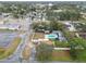 Aerial view showing home, pool, and surrounding neighborhood at 6040 Antrim St, New Port Richey, FL 34653