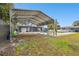 Covered carport with extra storage space at 6040 Antrim St, New Port Richey, FL 34653