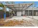 Spacious carport with a swing and grill at 6040 Antrim St, New Port Richey, FL 34653