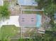 Overhead view showcasing home, yard, and pool at 6416 Finance Ave, Weeki Wachee, FL 34607